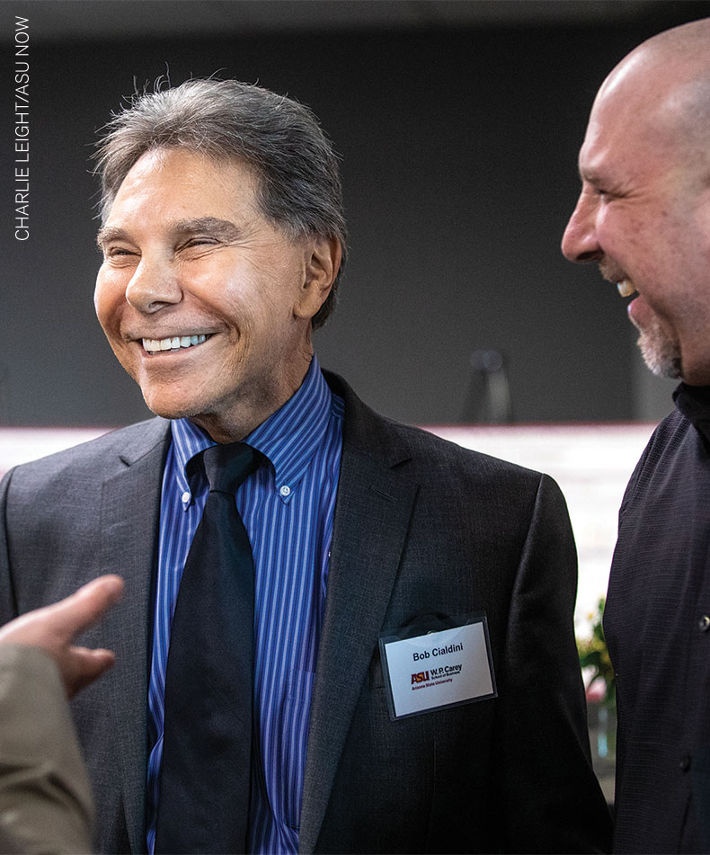 Cialdini visits with guests at the Robert B. Cialdini Behavioral Research Lab