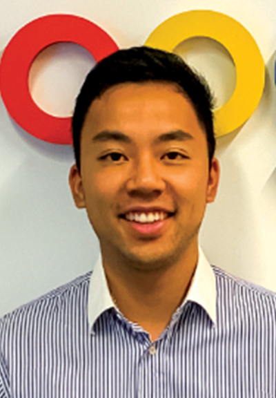 Xavier Lam smiling in Google building