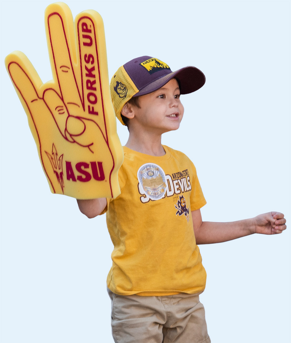 Child at event with ASU foam finger and hat
