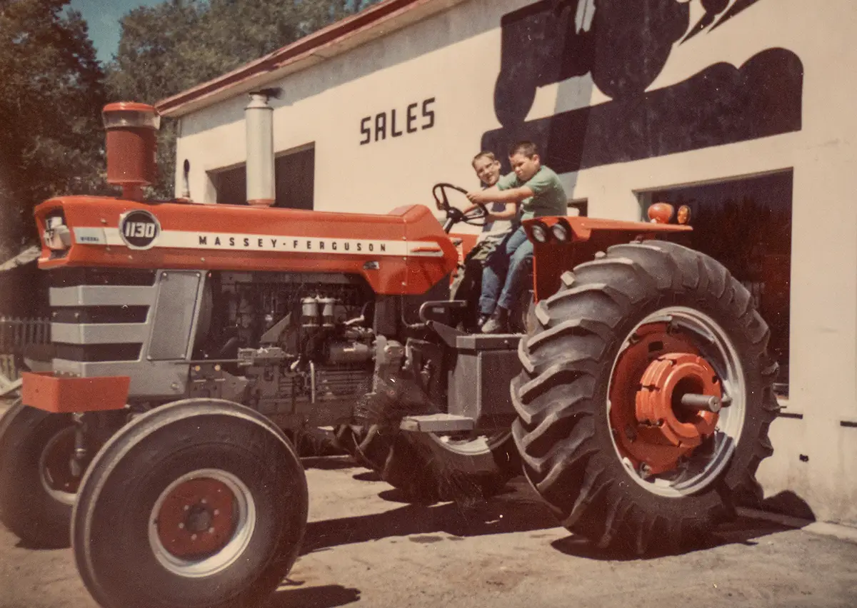 Sheldon Jones with his brother Kevin on a tractor