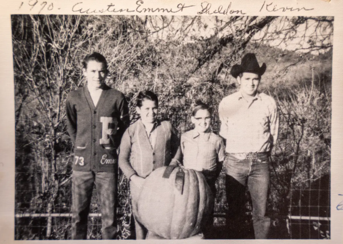 Emmett Jones, Sheldon Jones, Kevin Jones, and Austin Jones in the front yard of their home