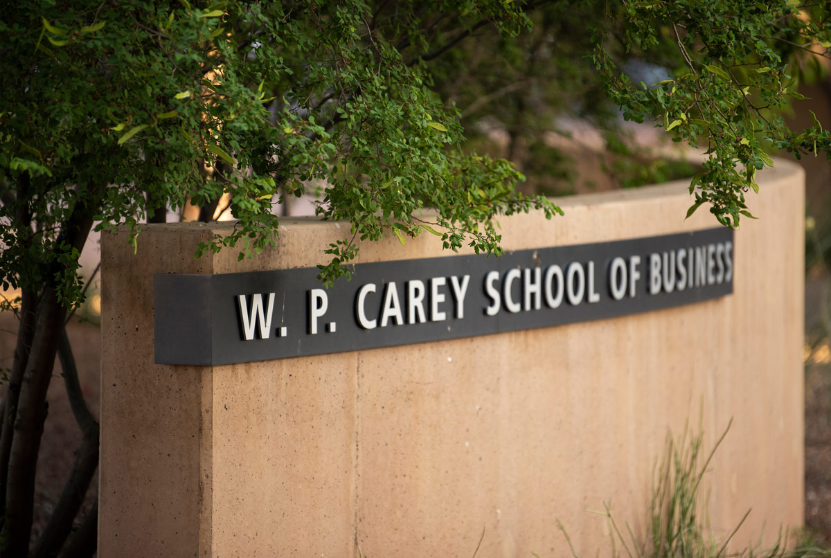 W.P. Carey School of Business sign on short outdoor concrete wall